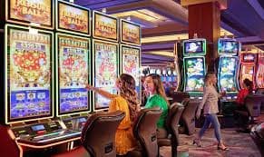 Filipino player browsing 9ph login casino slot games on a mobile phone